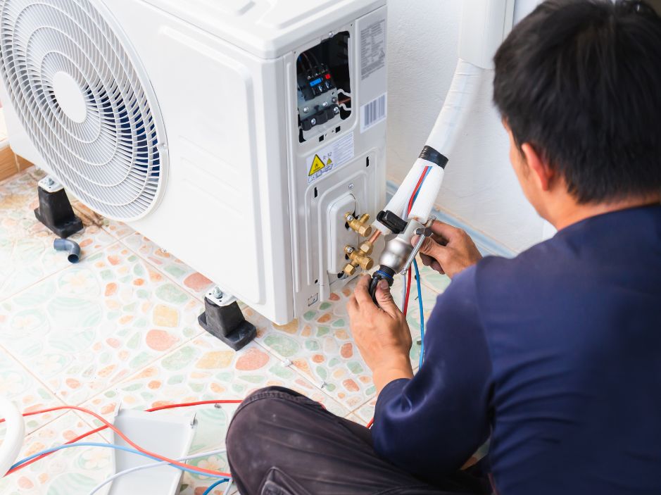 Male technician service for repair and maintenance of air conditioners