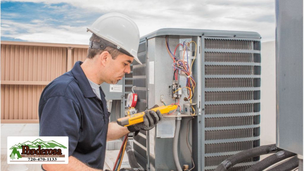 HVAC tech working on a condensing unit