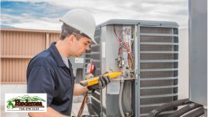 HVAC tech working on a condensing unit