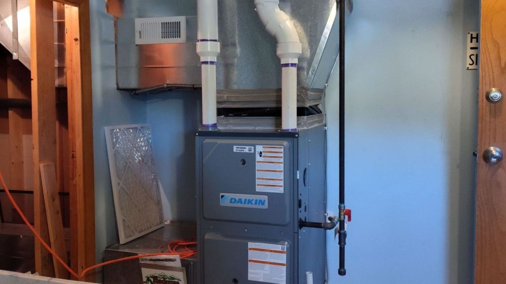 a furnace and air conditioner in a small room (2)