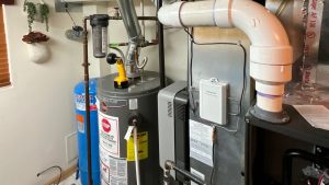 a gas furnace and water heater in a home