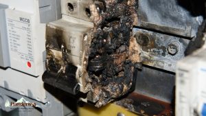 a close up of a burnt out electrical panel