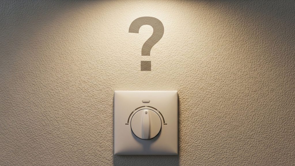 a light switch with a question mark on it